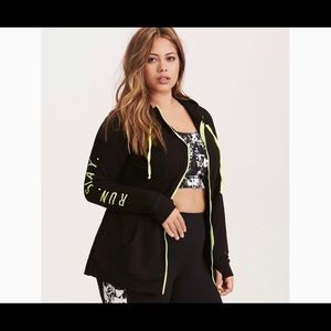 Torrid black Run Slay hoodie with neon hue.